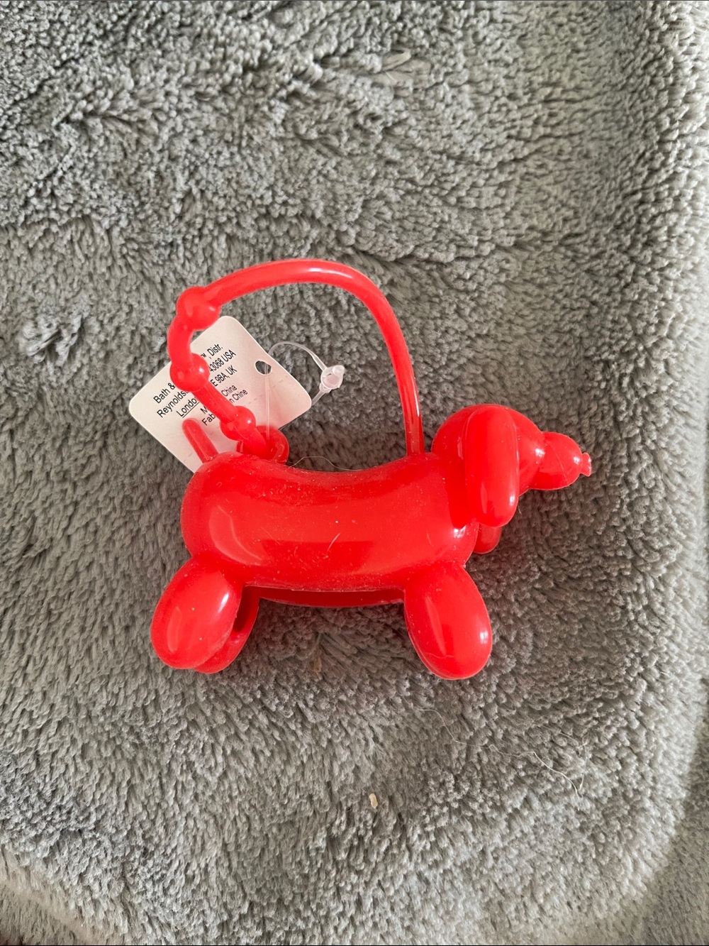 Bath and Body Works Red Balloon Dog sanitizer pocketbac holder.